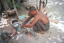 The Alchemist - This man, living nextdoor to the Amarapura indigo dyers, referred to himself as an alchemist. He explained that, by melting pellets of iron and adding bits and pieces of other metals he would make a magic metal which would turn all it touched to gold. Apparently this was similar to the myth relating to the funding of the building of the temples and monuments at Pagan.