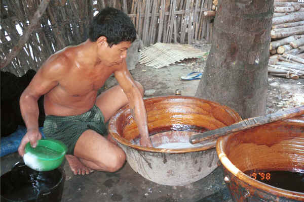 The first stage in the mixing of the rinsing mixture - adding sago and water - Amarapura, Shan State 9809g01.jpg