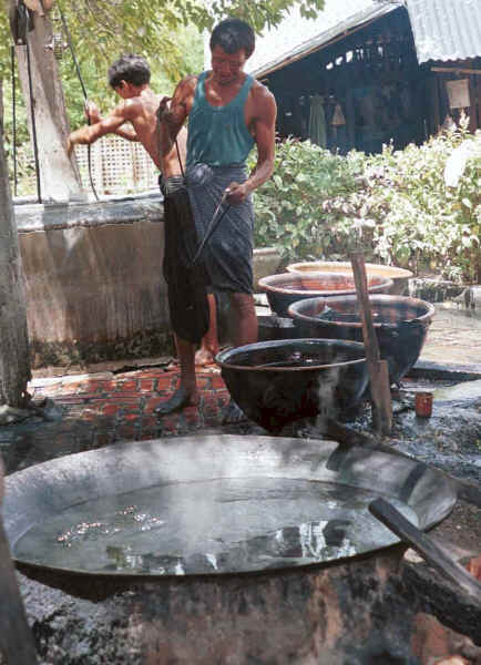 Getting water from the well for the rinsing process - Amarapura, Shan State 9809g03.jpg