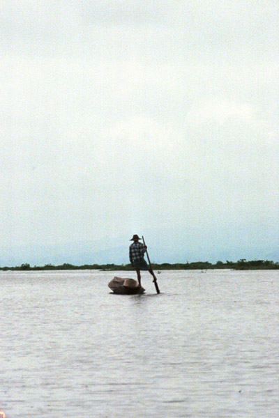 Jpeg 57K 9809P31 Intha boatman leg-rowing on Lake Inle, Shan State.