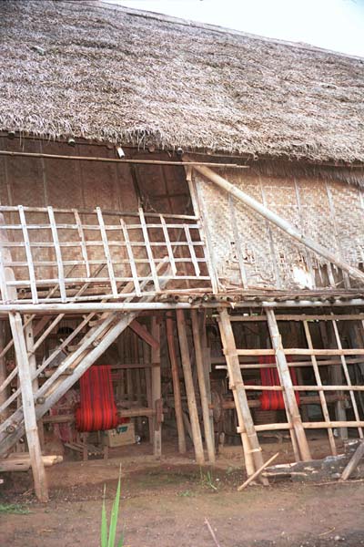 Jpeg 58K 9809R07 Looms set up for weaving Shan bags at the back of the floating market at Ywa-ma- Lake Inle, Shan State. 