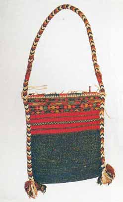 to Jpeg 59K This Jingpho bag is shown in Michael C Howard's book 'Textiles of the Hilltribes of Burma' (1999: page 163 Plate 120.) The bag itself is in the Bankfield Museum, Halifax (UK) collection and was originally lent to the Museum in 1900 by E.C.S.George and subsequently given to them by him in 1937. 