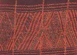 to Jpeg 58K detail of Zantu man's tunic