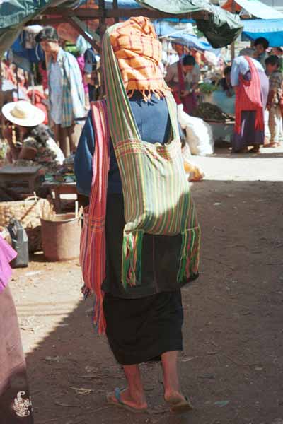 29K Jpeg 9809I07 Pa'O woman at Kalaw market, Shan State, with a typical Shan bag over her shoulder and a green striped one on her head carrying her supplies