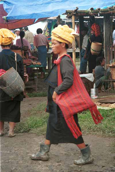 31K Jpeg 9809M36 Pa'O woman striding through Nampan 5-day rotating market, Lake Inle, Shan State