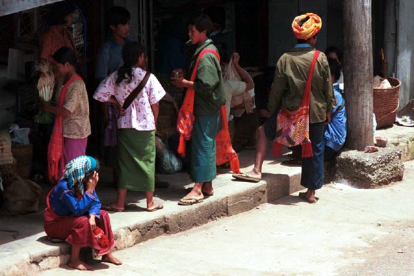 Jpeg 65K Silver Palaung buying their last supplies at a shop before they catch the bus bus back to their village after the Kalaw five-day rotating market in Shan State,