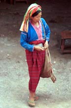 to Jpeg 72K Silver Palaung woman coming away from the market in Kalaw. Note her traditional woven bag for produce