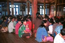 to 76K Jpeg Silver Palaung gathering together to pray in the Buddhist temple in the centre of Pein Ne Bin village near Kalaw, northwestern Shan State on 'Full Moon Day' after the night of the full moon.