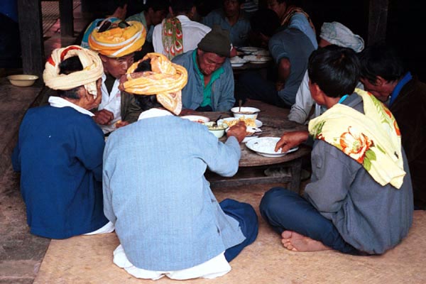 63K Jpeg Silver Palaung men eating the communal meal at the 'Full Moon day' festival in Pein Ne Bin village near Kalaw, southwestern Shan State