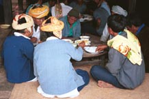 to 63K Jpeg Silver Palaung men eating the communal meal at the 'Full Moon day' festival in Pein Ne Bin village near Kalaw, southwestern Shan State