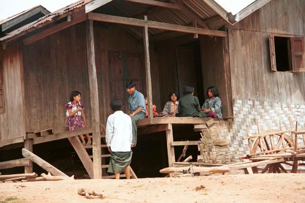 67K Jpeg A Silver Palaung family sitting on their porch in Pein Ne Bin village, near Kalaw in southwestern Shan State