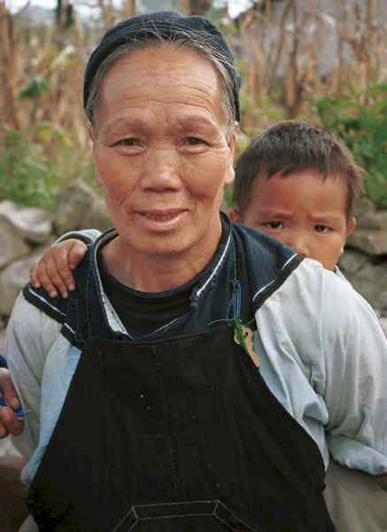 Bouyei grandmother and grandson - Bi Ke village, Mi Gu township, Zhenfeng county, Guizhou province 0010s23.jpg