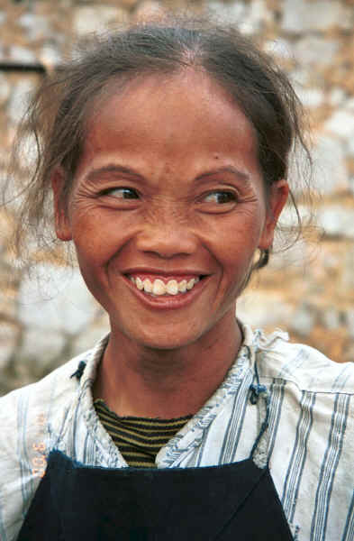 One of the Bouyei women selling textiles - Bi Ke village, Mi Gu township, Zhenfeng county, Guizhou province 0010t03.jpg