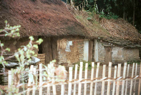 Thatched roof, stone walled house in Chang Tion village, Cheng Guan township, Puding county, Guizhou province 0010v33.jpg