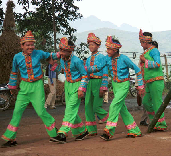 Boys in the dance troupe pretending to walk like old men - Da Shu Jia village, Xin Zhou township, Longlin county, Guangxi province 0010h08.jpg