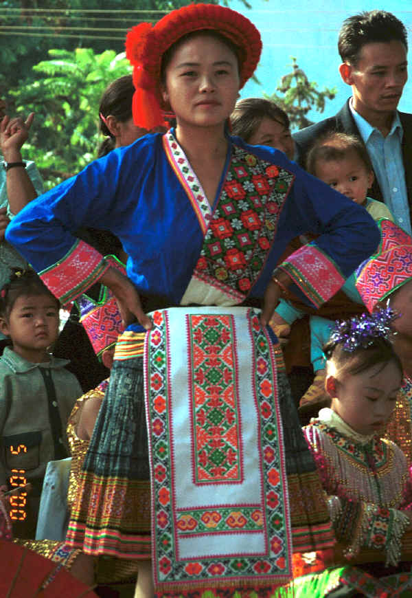 Red Hat Miao costume on one of the dancers - Da Shu Jia village, Xin Zhou township, Longlin county, Guangxi province 0010h31.jpg