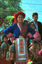 Jpeg 78K Red Hat Miao costume on one of the dancers - Da Shu Jia village, Xin Zhou township, Longlin county, Guangxi province 0010h31.jpg