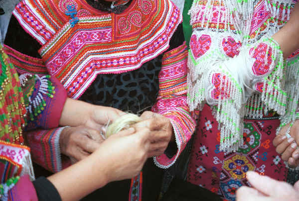 Examining some hemp or ramie fibre - Da Shu Jia village, Xin Zhou township, Longlin county, Guangxi province 0010i16.jpg