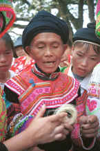 Jpeg 81K Clean Water Miao old lady examining hemp or ramie fibre - Da Shu Jia village, Xin Zhou township, Longlin county, Guangxi province 0010i17.jpg