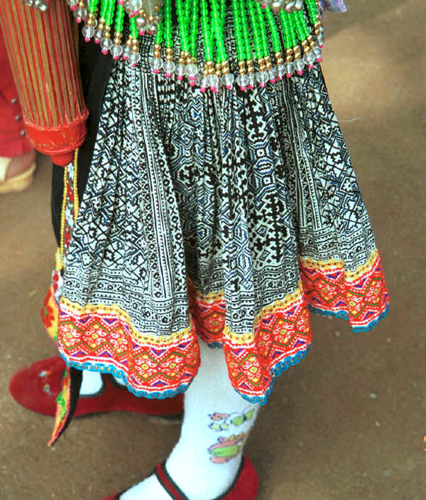 Young girl's skirt - probably batik on cotton - shows two intensities of indigo in the pattern which may suggest 2 waxings - Da Shu Jia village, Xin Zhou township, Longlin county, Guangxi province 0010i36.jpg