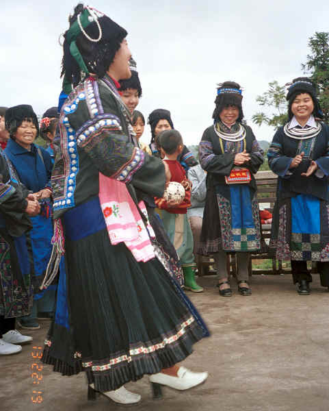 Black Miao girls dancing in their festival costumes - Dai Lo village, Shi Zi township, Ping Ba county, Guizhou county 0010z21.jpg
