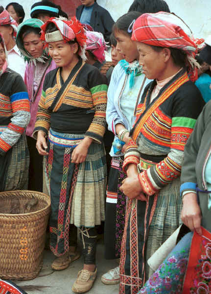 Flower Miao women together with some Side Comb Miao with their textiles, De Wo market, De Wo township, Longlin county, Guangxi province. 0010f36.jpg