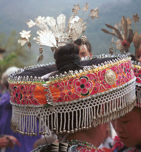 Jpeg 126K Excessively decorated woman's head dress in the fashion of the dancing troupes, Gao Zhai village, Bai Jin township, Huishui county, Guizhou province 0110D05