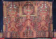 to Jpeg 66K 1475 detail of embroidery on side panel of Ba sa dung Li woman's blouse