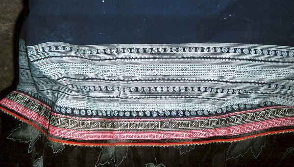 Top of Side comb Miao woman's skirt showing the indigo batik and inset strip of embroidery - Long Dong village, De Wo township, Longlin country, Guangxi provinc 0010e24.jpg