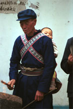 Jpeg 50K Musician welcoming us into Lou Jia Zhuang village, Anshun city, Guizhou province 0110A35