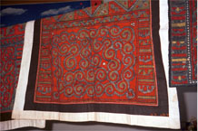 to Jpeg 102K Wax resist (batik), indigo, red and yellow dyed baby carrier piece, Lou Jia Zhuang village, Anshun city, Guizhou province 0110B33