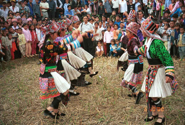 Young White Miao girls dancing in Ma Wo village, Zhe Lang township, Longlin county, Guangxi province 0010j22.jpg