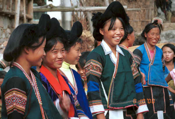 Side Comb Miao girls and married woman in festival finery - Pao Ma Cheng village, Teng Jiao township, Xingren country, Guizhou province 0010n06.jpg