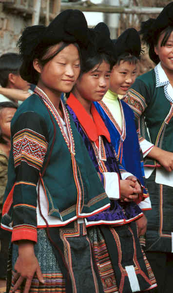 Side Comb Miao girls in their festival finery - Pao Ma Cheng village, Teng Jiao township, Xingren country, Guizhou province 0010n07.jpg