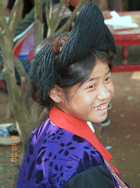 Side Comb Miao - unmarried girl's hair dressed with black wool - Pao Ma Cheng village, Teng Jiao township, Xingren country, Guizhou province 0010n32.jpg