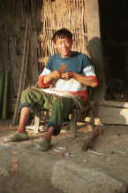 Jpeg 36K Side Comb Miao basket maker outside his house Pao Ma Cheng, Teng Jiao township, Xingren country, Guizhou province 0010o21.jpg