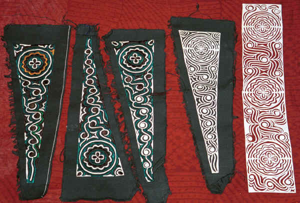 close up of a finished paper cut and partly embroidered paper cuts from Side Comb Miao Pao Ma Cheng village, Teng Jiao township, Xingren country, Guizhou province 0010r14.jpg 