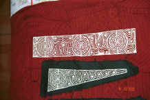 Jpeg K close up of a finished paper cut and partly embroidered paper cuts from Side Comb Miao Pao Ma Cheng village, Teng Jiao township, Xingren country, Guizhou province 0010r15.jpg