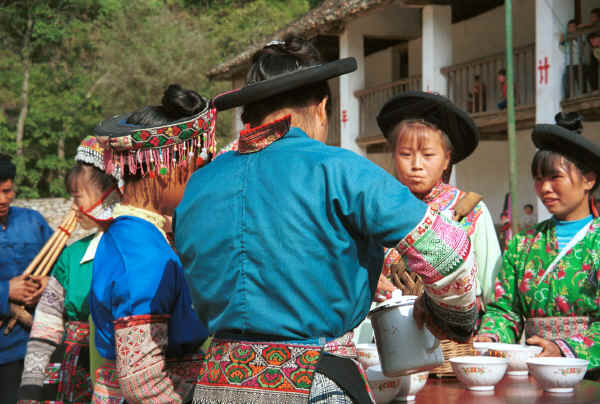 Pouring out the welcome libation - Sha Jiao village, Wan Teng township, Xingyi metropolitan area, Guizhou province 0010l32.jpg