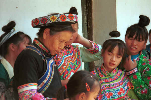Miao dancers and textile seller - Sha Jiao village, Wan Teng township, Xingyi metropolitan area, Guizhou province 0010m16.jpg