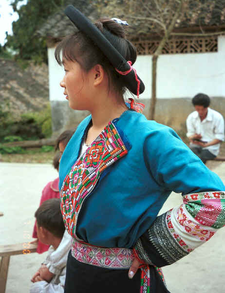 Young Miao woman with a jacket more in the Red Hat Miao style - Sha Jiao village, Wan Teng township, Xingyi metropolitan area, Guizhou province 0010m22.jpg