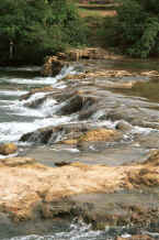 Jpeg 38K Tumbling water in the river as it approaches the entrance to Shitou village, Huanggousu township, Zhen Nin county, Guizhou province 0010t31.jpg