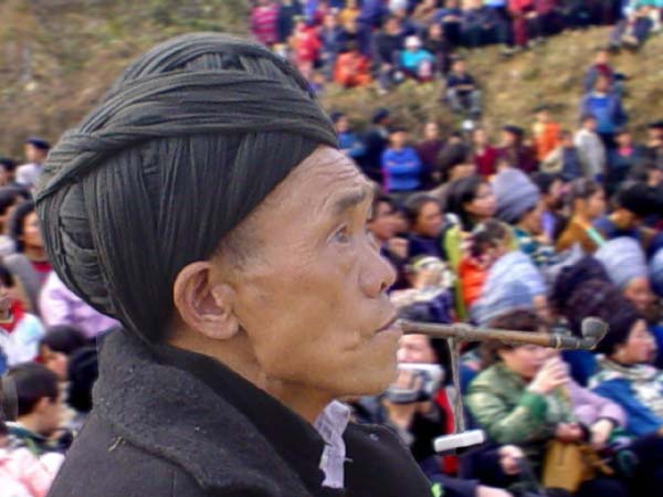 Jpeg 37K An old man smoking his pipe at a festival in a Miao village in Songtao Miao Autonomous County, Tongren Prefecture, eastern Guizhou Province.