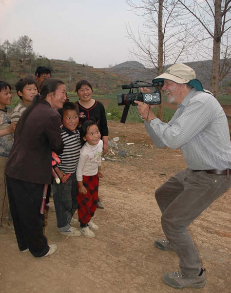 Jpeg 63K Photographing White Miao at the White Miao Dance Flower festival near Dafang in April 2007