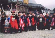 to Jpeg 54K e17e The Shaman and and leading men of the village at the dancing on 29 February 2004, Langde village, Guizhou province