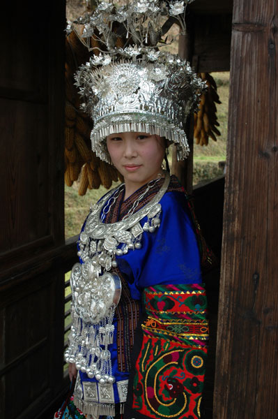 68K Jpg image Tony's bride, Huyan, although she is Han and not Miao, is wearing the traditional Long Skirt Miao festival clothes of Tony's village, Langde for the wedding.