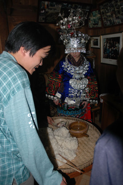 59K Jpg image Inside the groom's house the food to be offered by the bride to the ancestors of the groom's family.