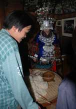 to 59K Jpg image Inside the groom's house the food to be offered by the bride to the ancestors of the groom's family.