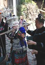 to 73K Jpg image The bride carrying the water to the groom's house