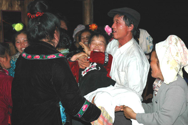 54K Jpg image The villagers from the groom's village wrestling for fun.